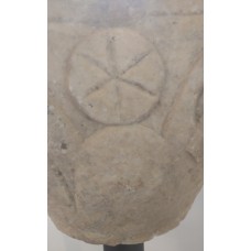 Capital of a pillar, six-point sun symbol, solar disc